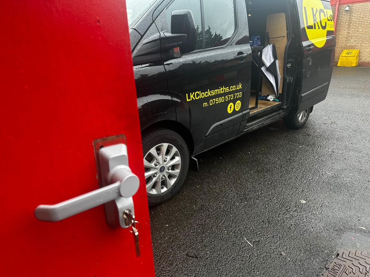 LKC Locksmiths branded van with tools, parked at a job in Glasgow